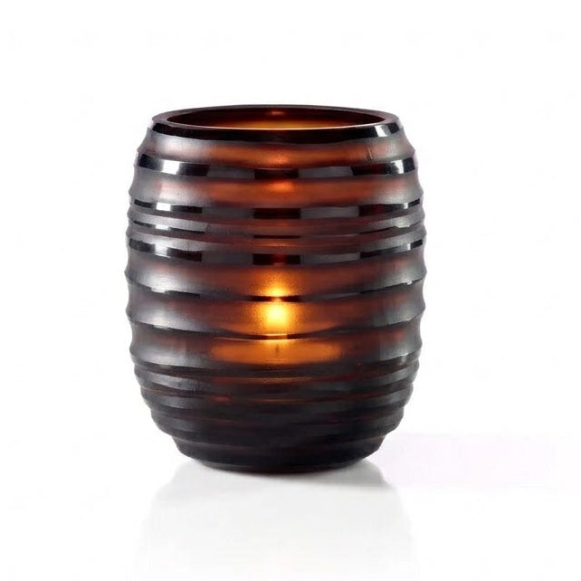 Decorative glass vase with wicker-like pattern on a white background