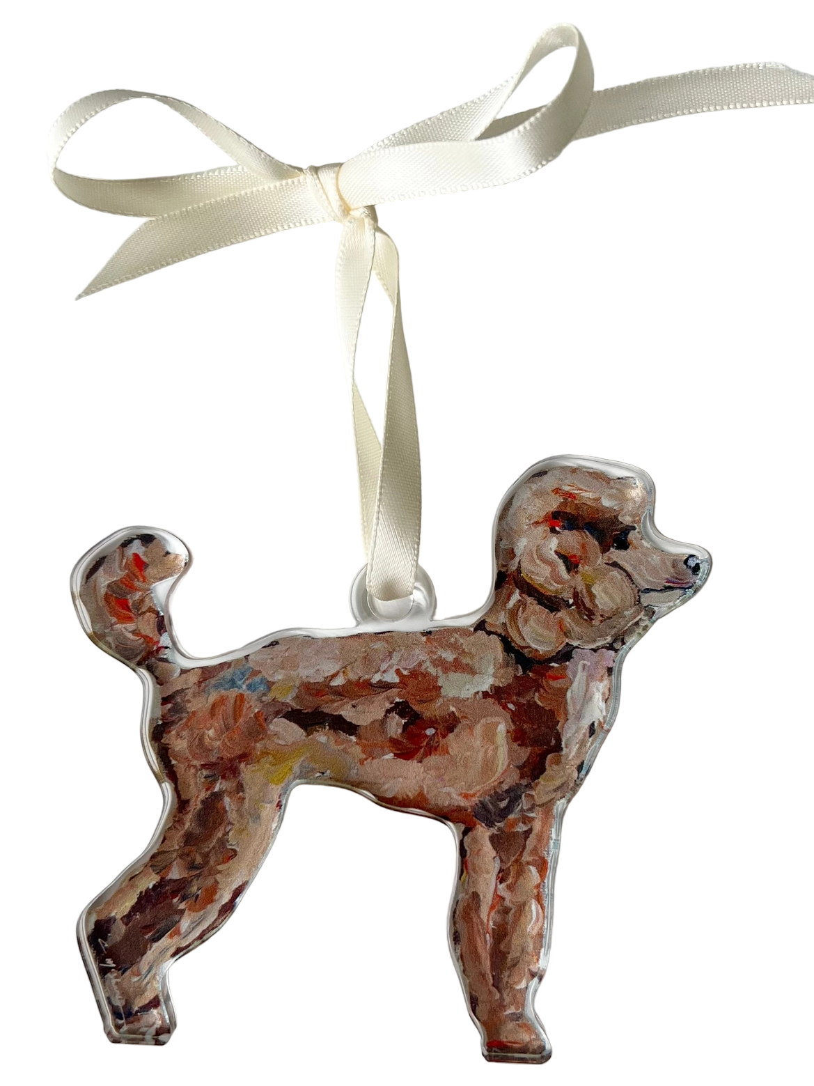 Decorative dog ornament with a ribbon on a light gray background