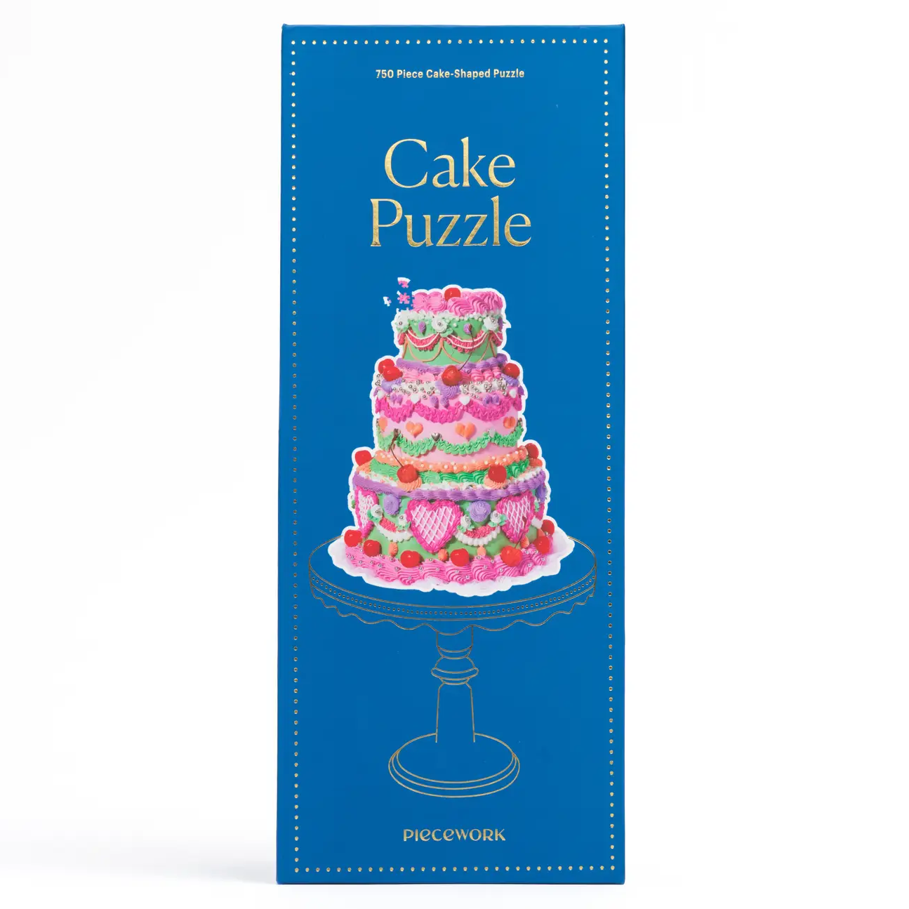 Cake-shaped puzzle packaging with a colorful cake illustration on a blue background