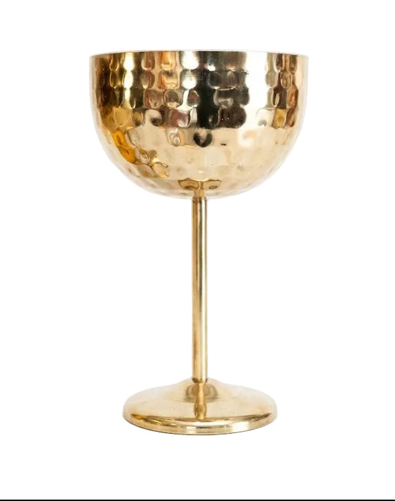 Gold metallic goblet on a white background