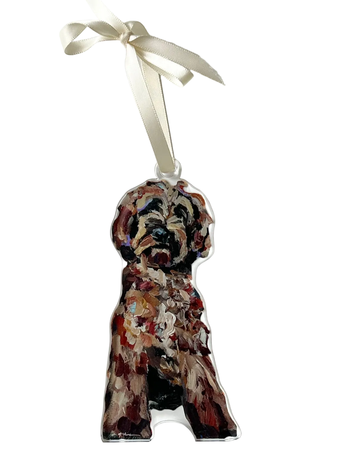 Decorative dog ornament with a ribbon on a light gray background
