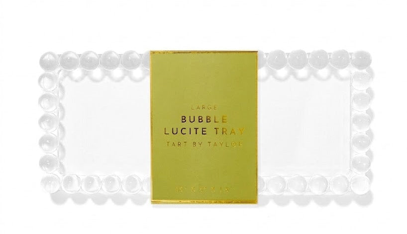 Bubble Lucite tray with a gold label on a white background