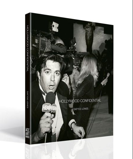 Book cover of 'Hollywood Confidential' with a black and white photo of a person holding a microphone.