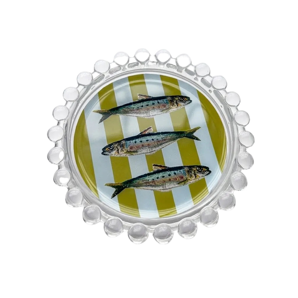 Decorative plate with fish design on a white background