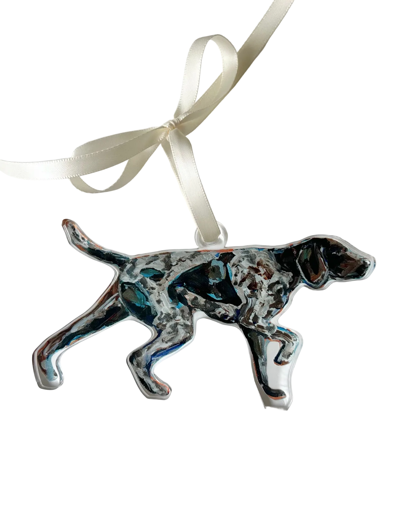 Decorative dog ornament with a ribbon on a white background