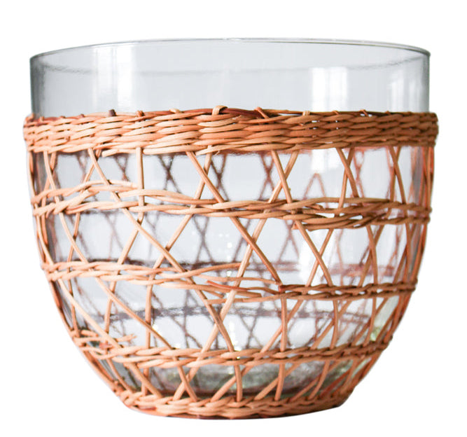 Clear glass vase with wicker basket design on a white background
