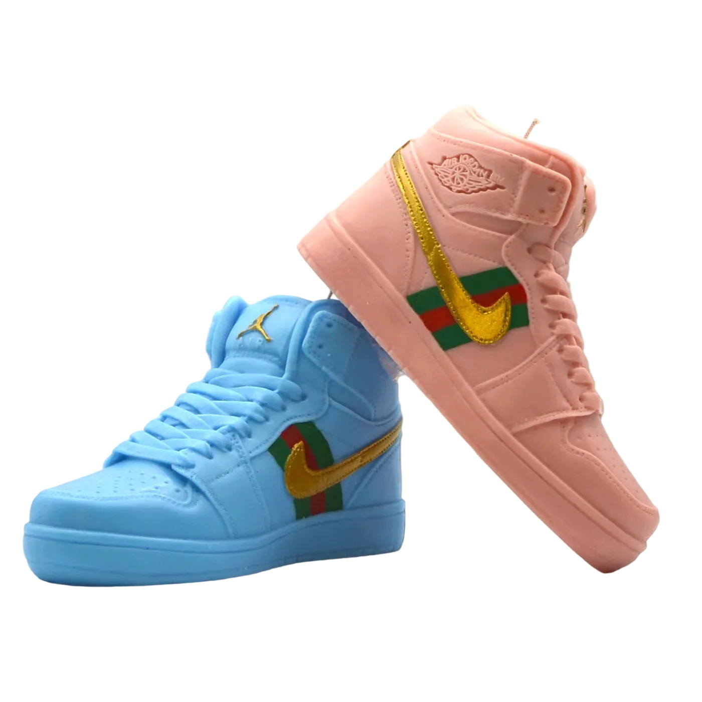 Two high-top sneakers styled like the Air Jordan 1: one in light blue and one in light pink, both featuring a gold Jumpman logo and a green and red side stripe detail, set against a solid cream background.
