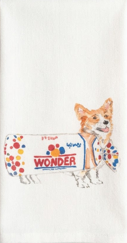 White towel with a colorful dog graphic and 'Wonder' text on a white background