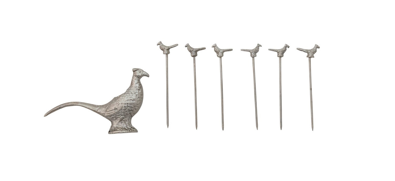 Set of silver pheasant-shaped cocktail picks with packaging on a white background