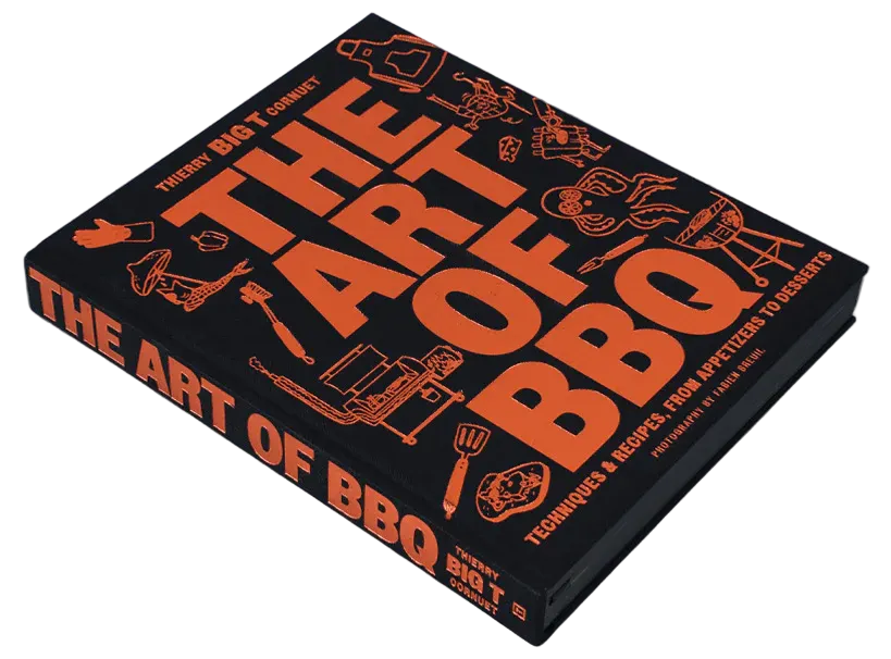 Book titled 'The Art of BBQ' with orange text on a black background