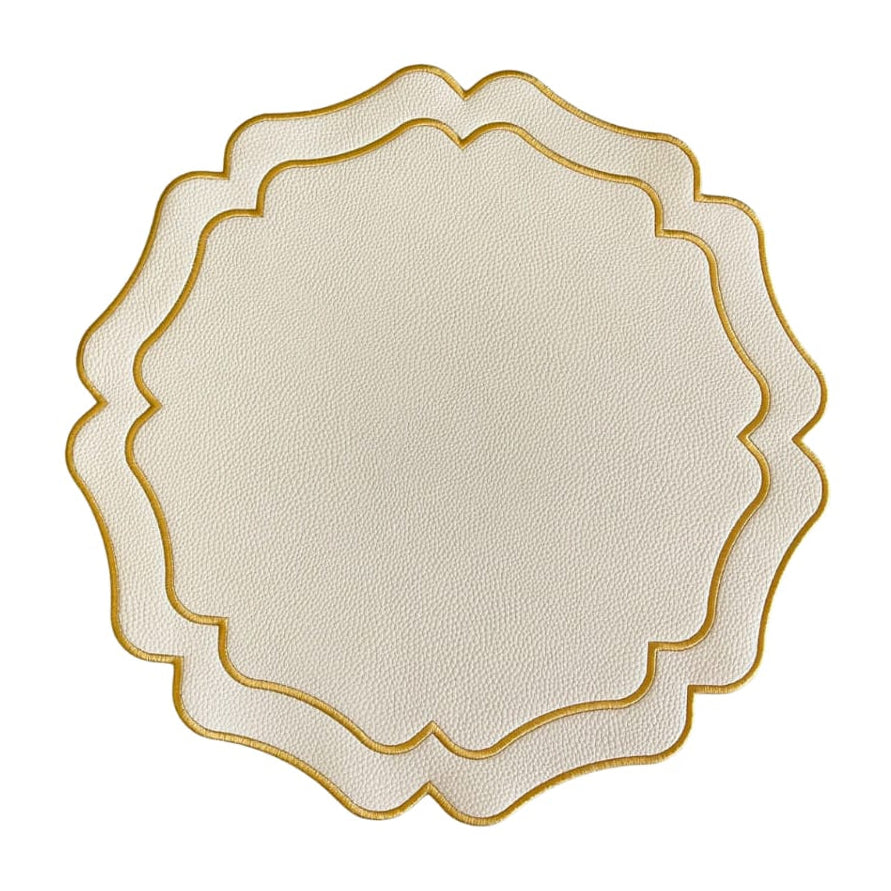 Round beige placemat with gold edge on a white background
