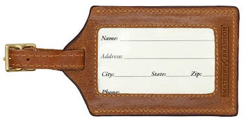 Back of needlepoint luggage tag with clear ID window