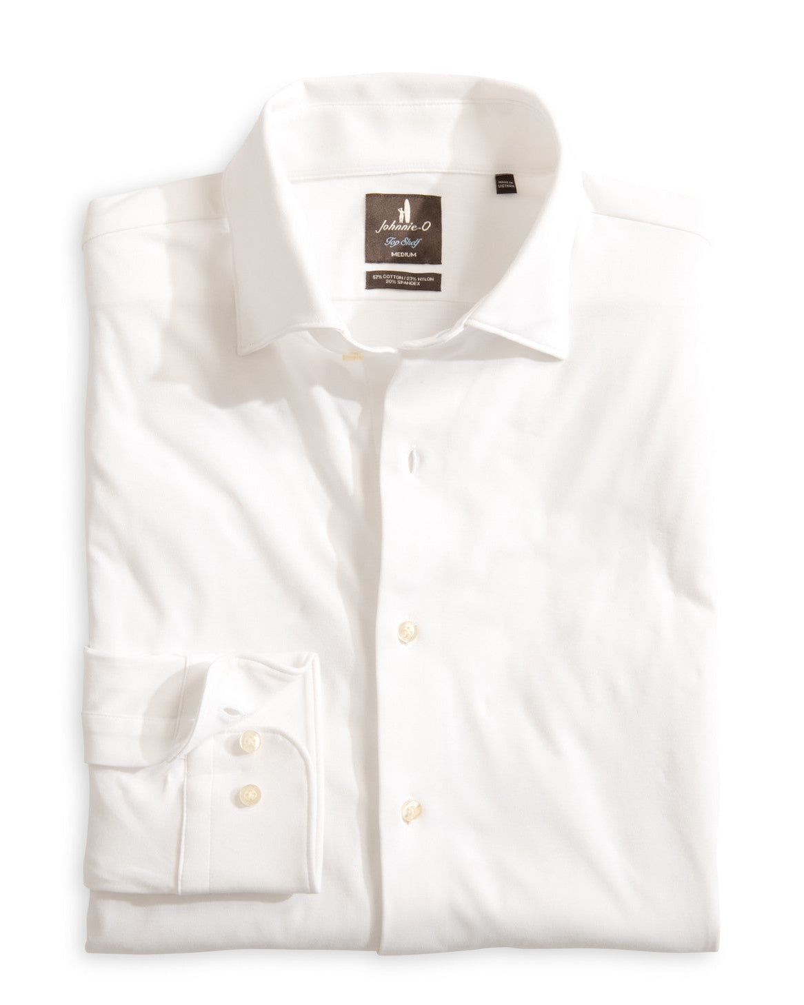 White dress shirt with a brand label on a white background