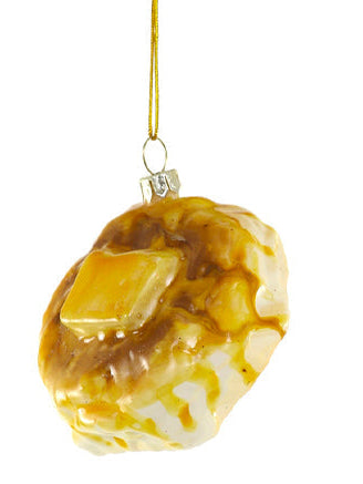 Decorative glass ornament with marbled pattern on a white background