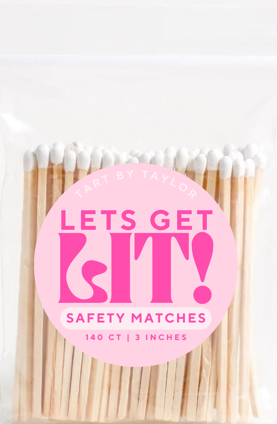 Pack of safety matches with a pink label on a white background