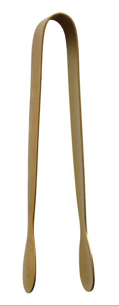 Gold tongs on a white background