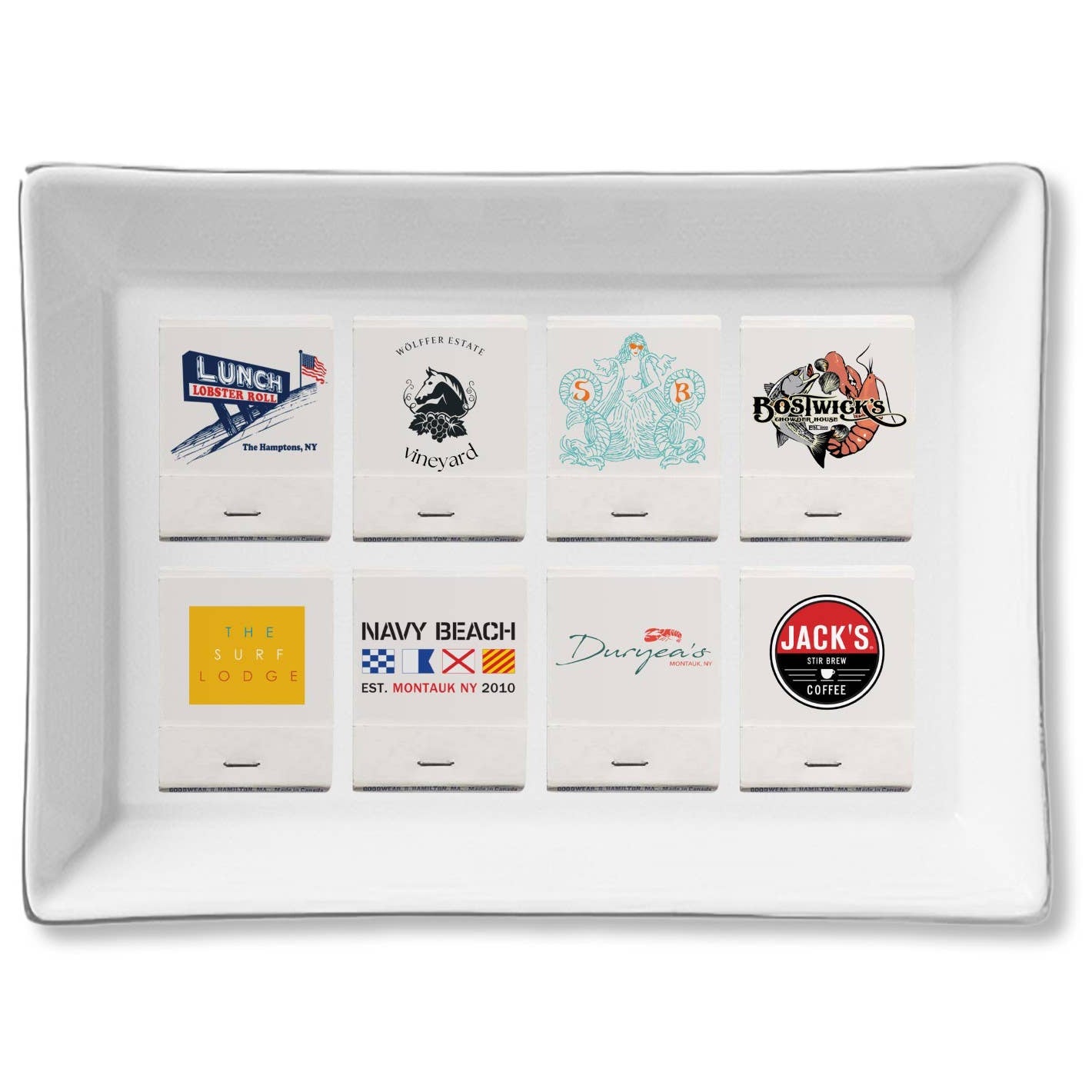 White tray with various branded coasters on a white background