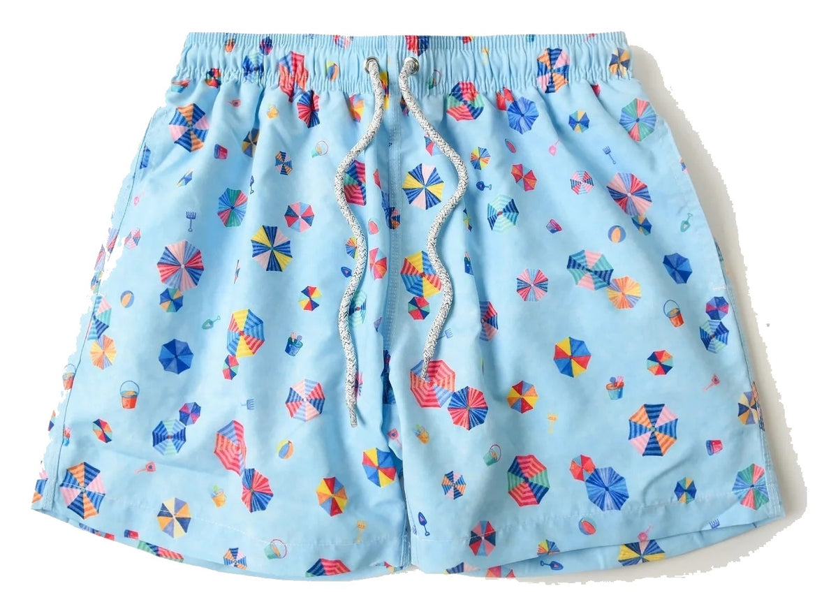 Light blue swim shorts with colorful floral pattern on a white background
