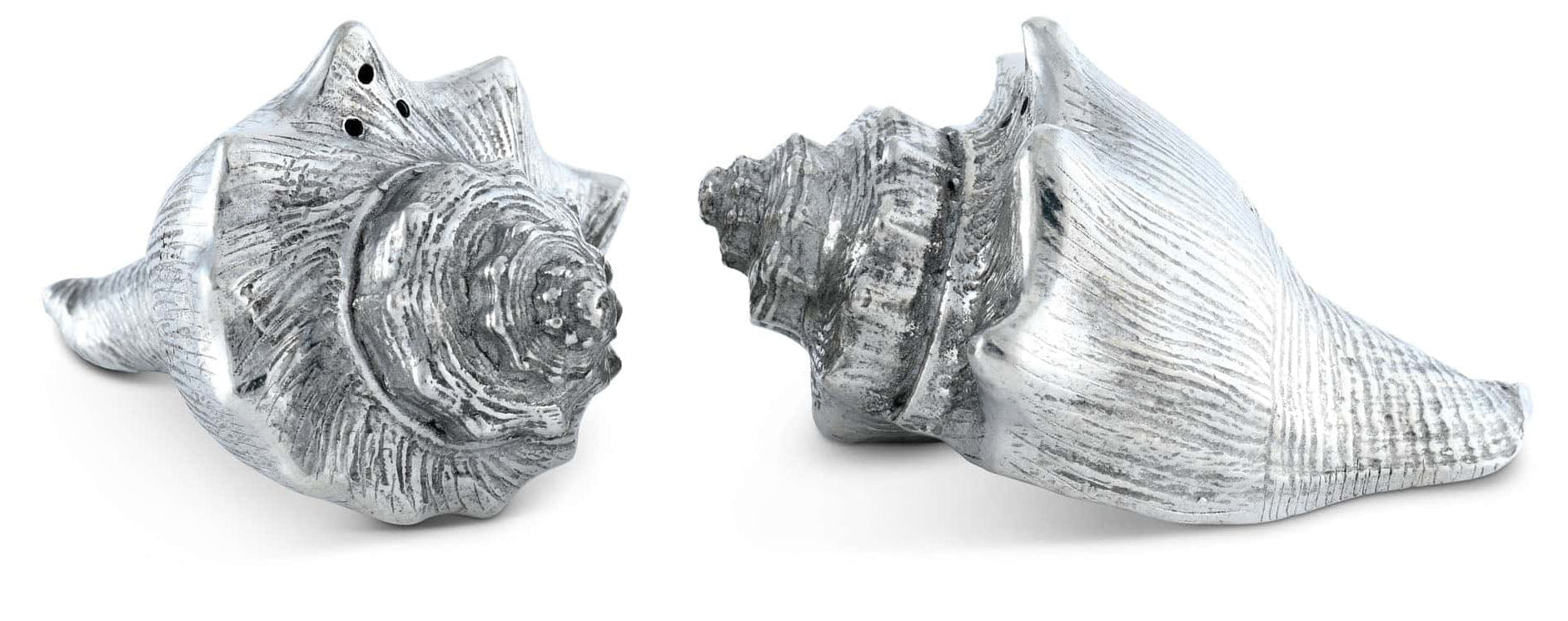 Silver conch shell salt and pepper shakers on a white background