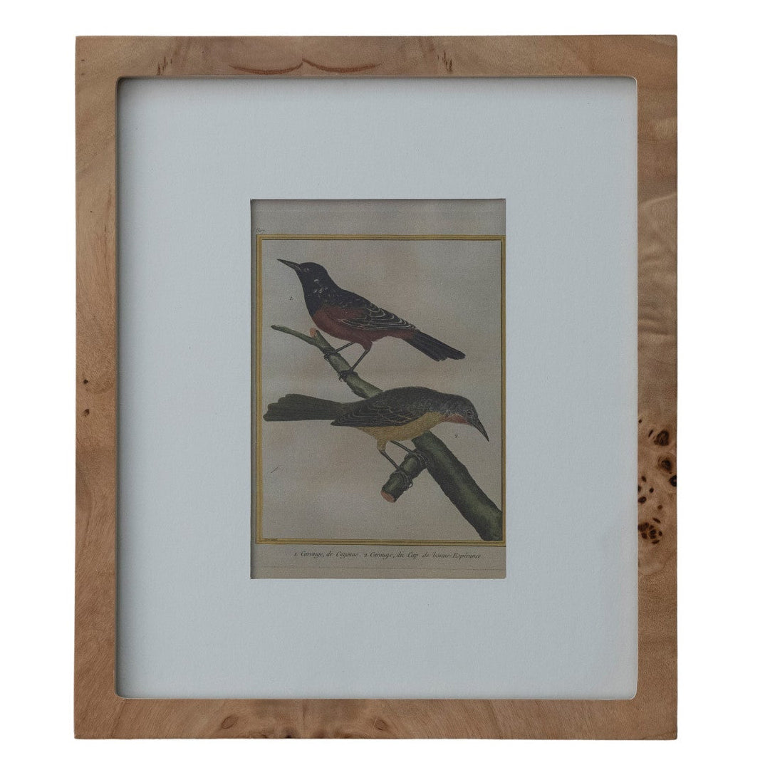 Framed artwork of two birds on a branch with a wooden frame.