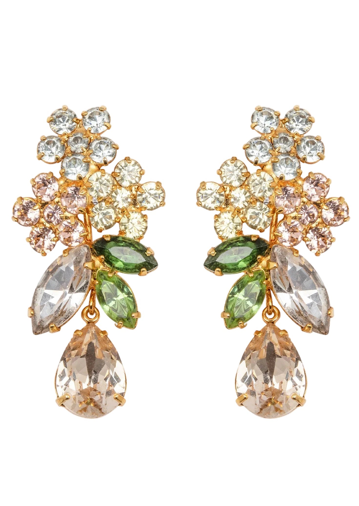 Pair of ornate earrings with gemstones on a white background