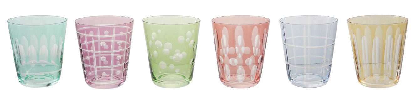Set of six colorful glass tumblers on a white background