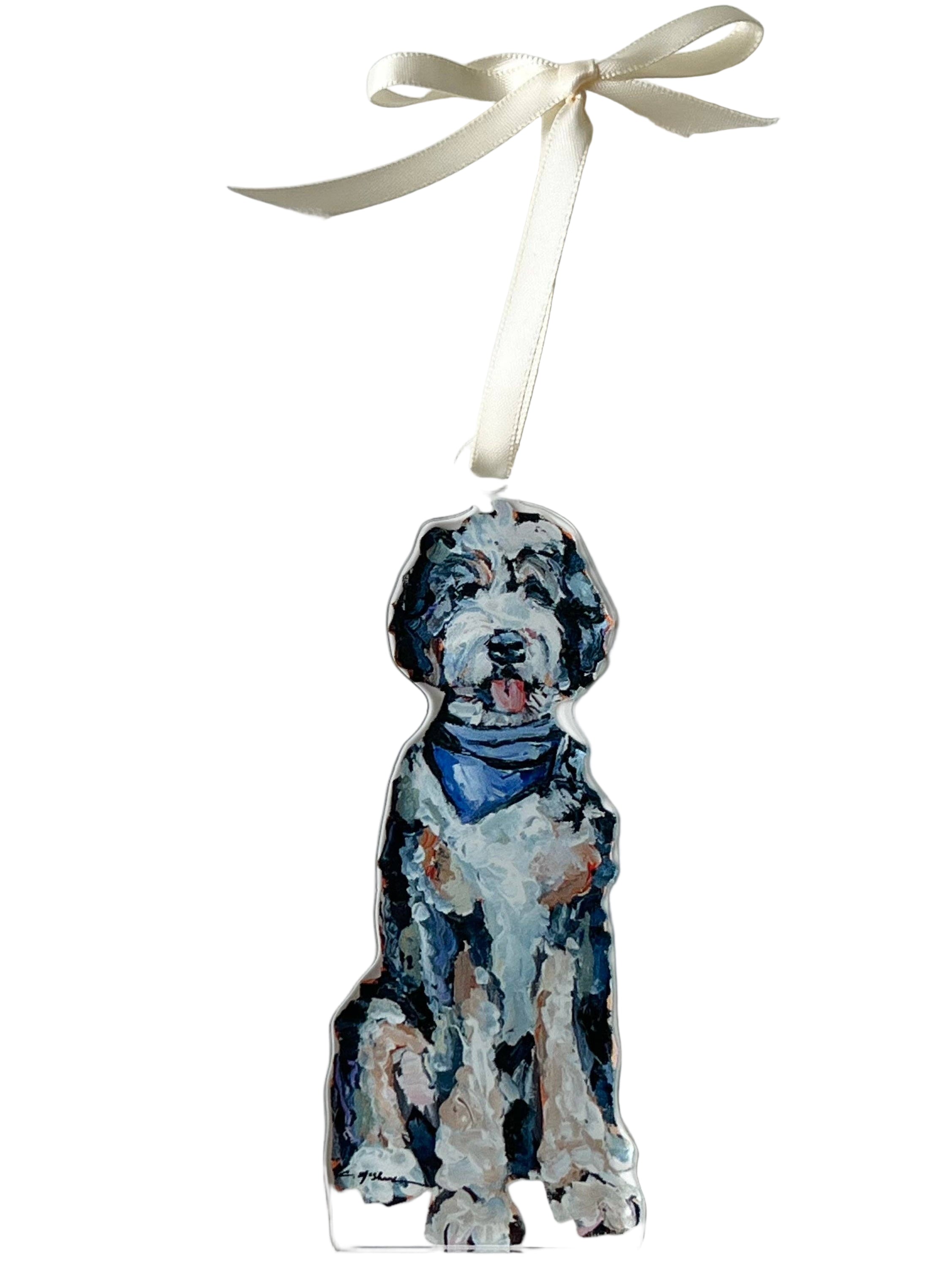 Dog ornament with a blue collar on a white background