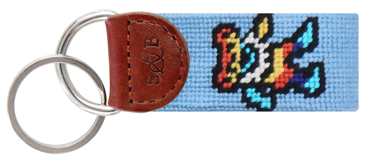 Keychain with colorful design on a blue background