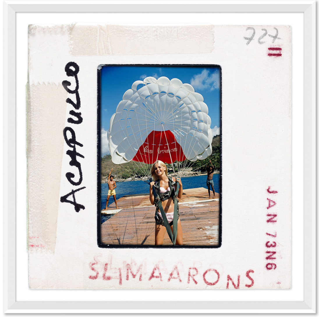 "Paragliding in Acapulco - Slide" by Slim Aarons, January 1, 1968 - Acapulco, Mexico