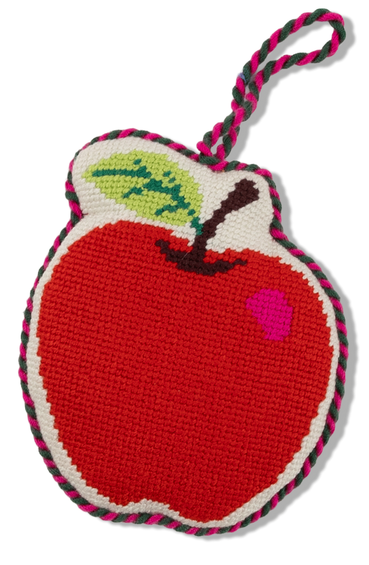 Crocheted apple-shaped toy with a string on a white background
