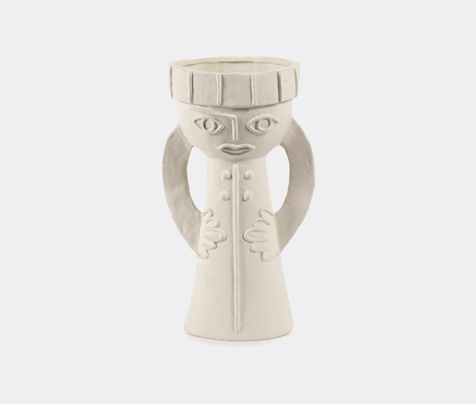 White ceramic vase with face design on a white background