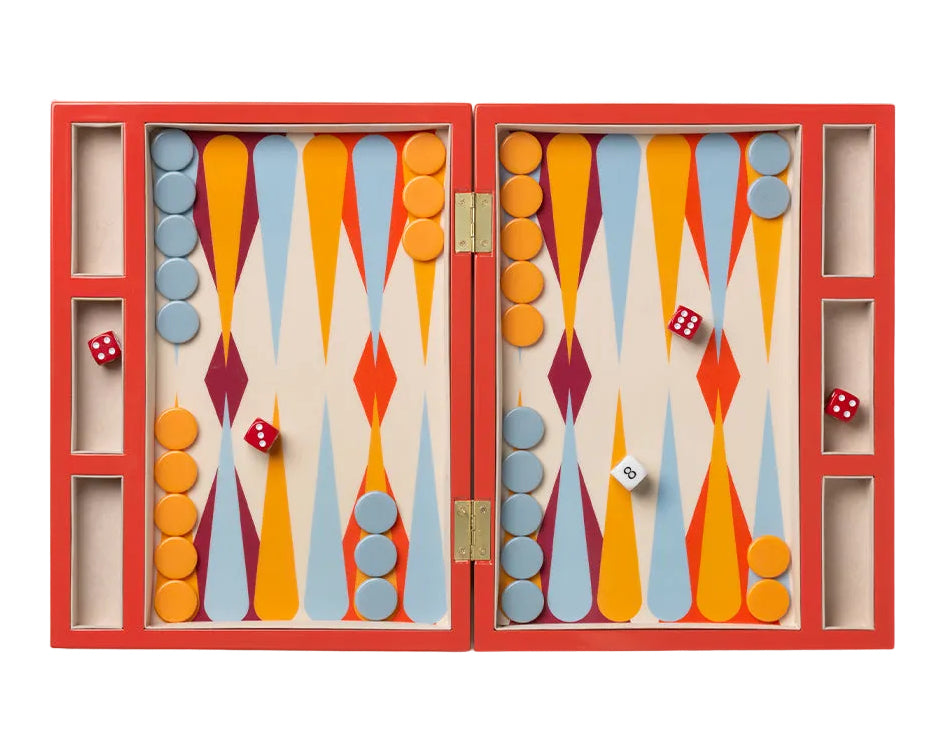 Colorful backgammon set with pieces and dice on a white background