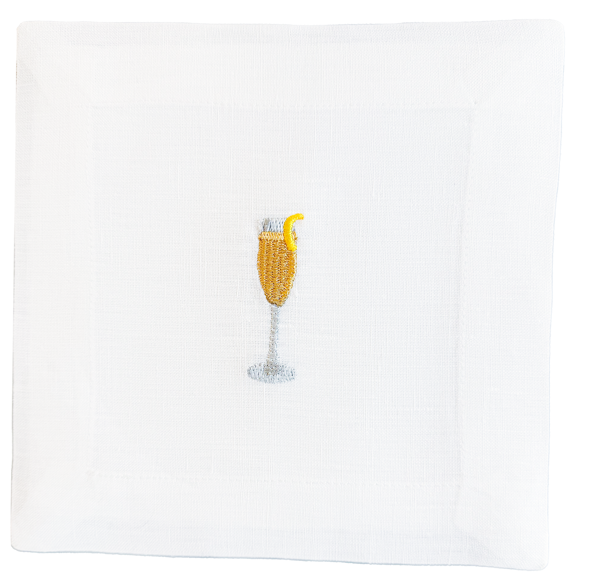 Embroidered design of a cocktail with a lemon twist on a white fabric background