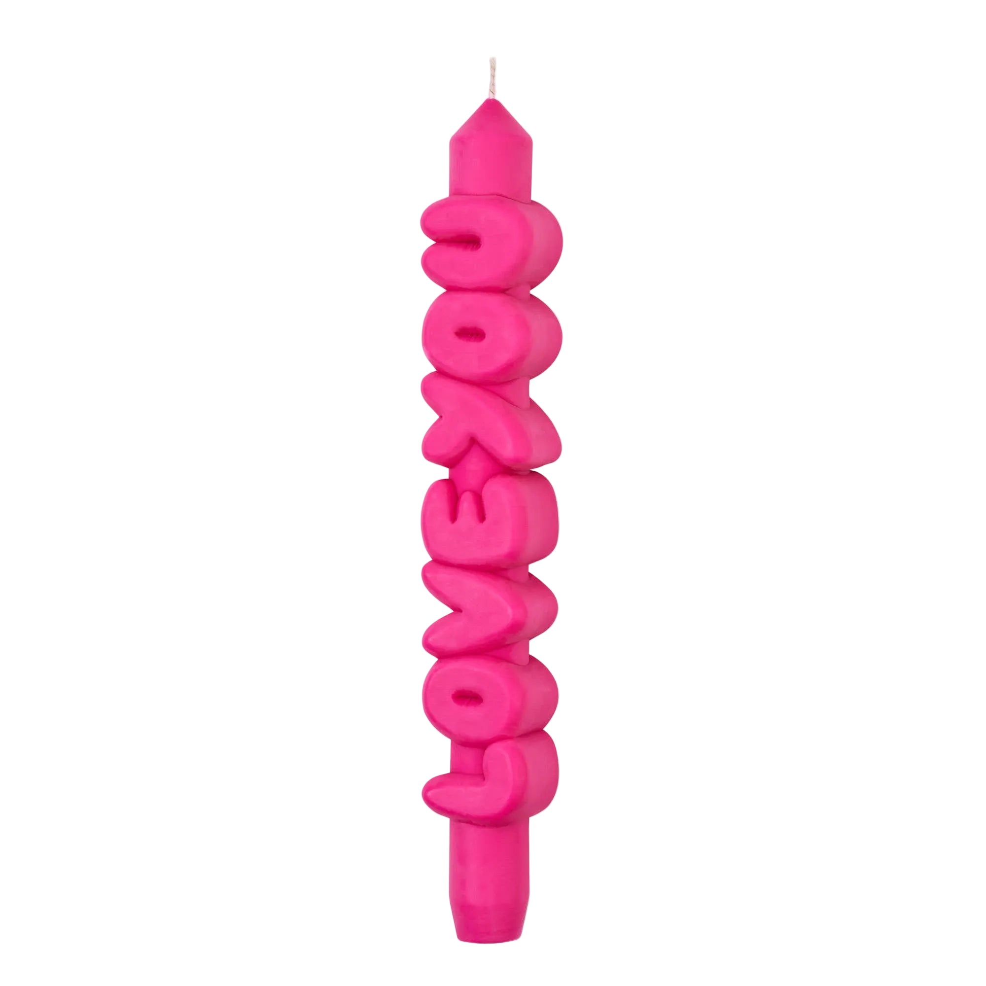 Pink candle with 'LOVE' text on a white background