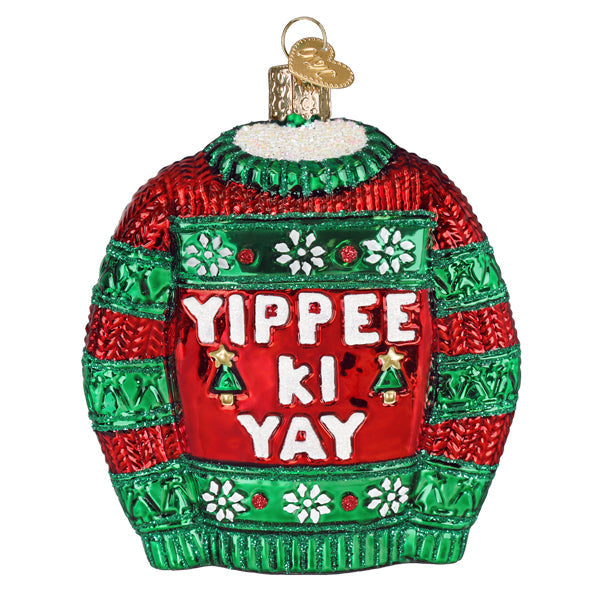 Christmas ornament shaped like a sweater with 'Yippee Ki Yay' text on a white background
