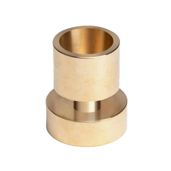 Brass cylindrical object on a light gray background