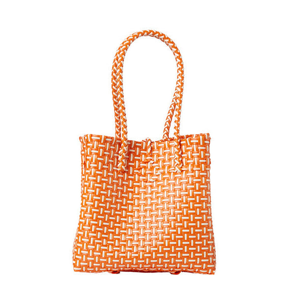 Orange woven tote bag on a white background