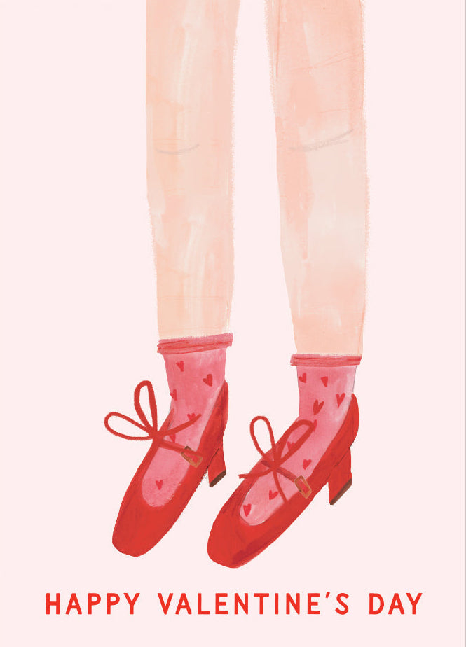 Illustration of feet in red shoes and socks with 'Happy Valentine's Day' text on a light pink background
