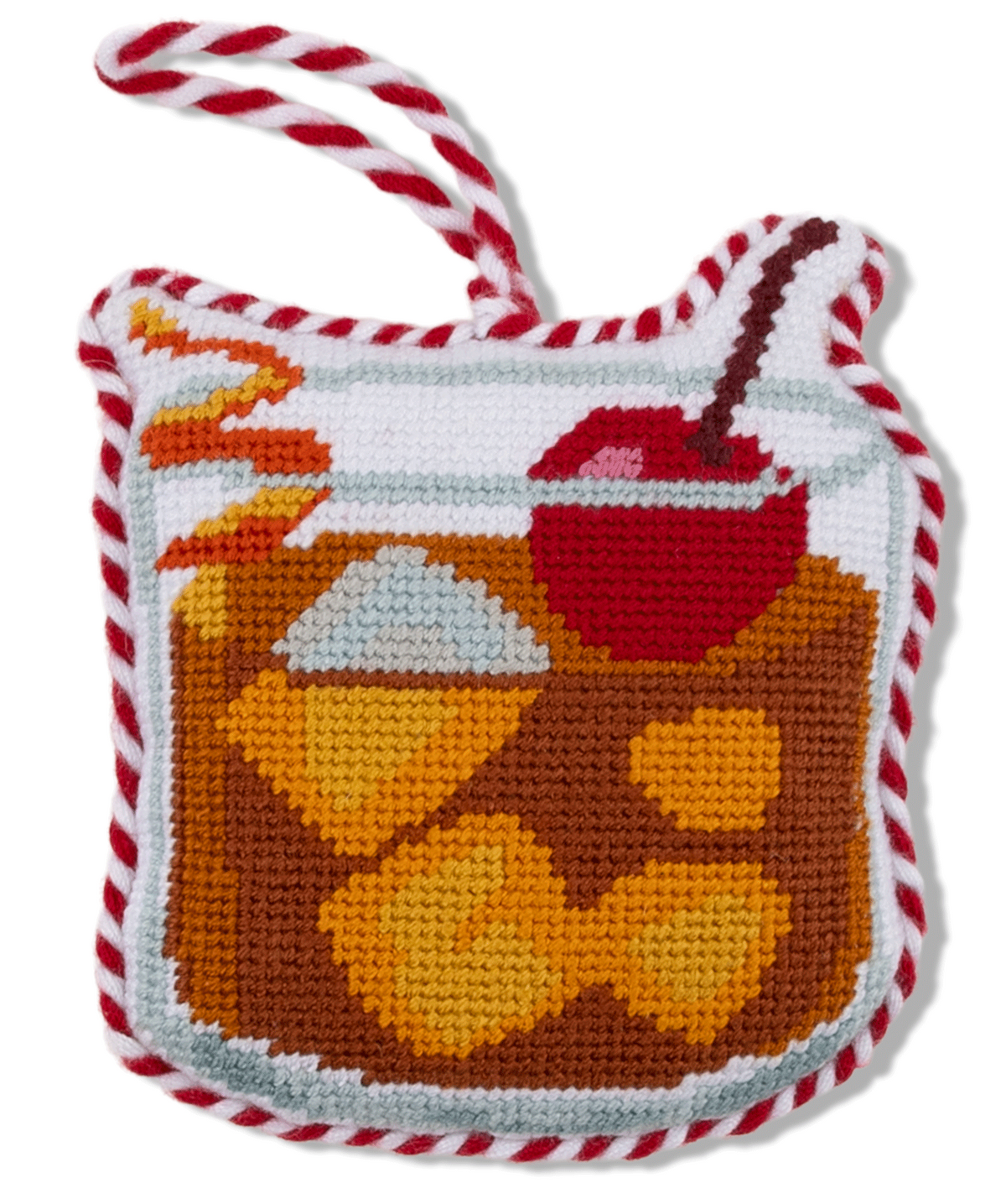 Crocheted dog toy with a design of a jar of pickles on a white background
