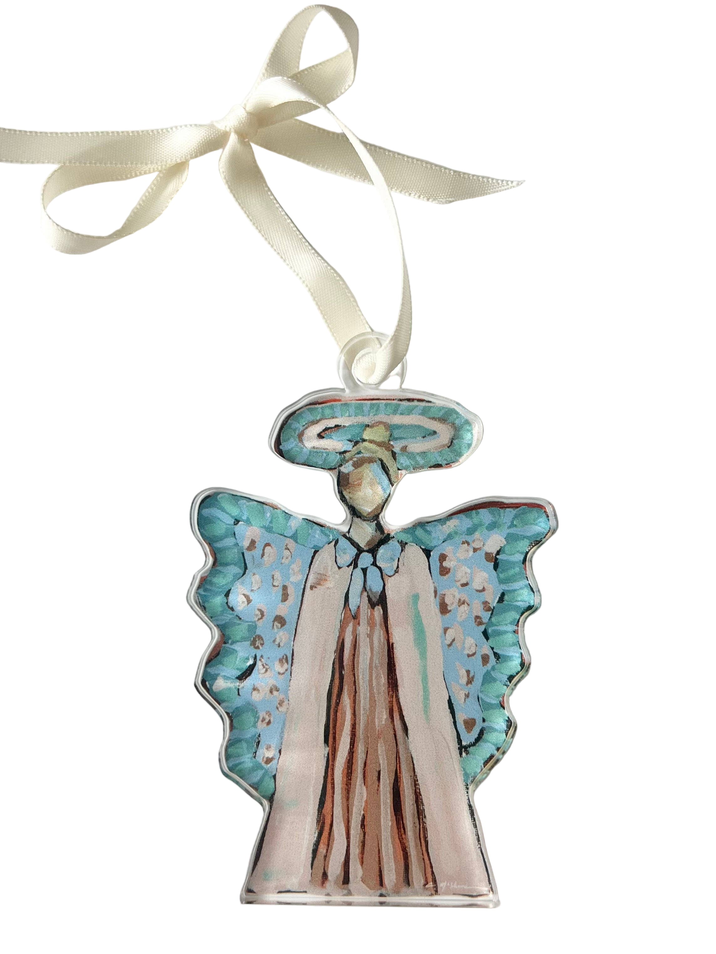 Decorative angel ornament with a ribbon on a white background