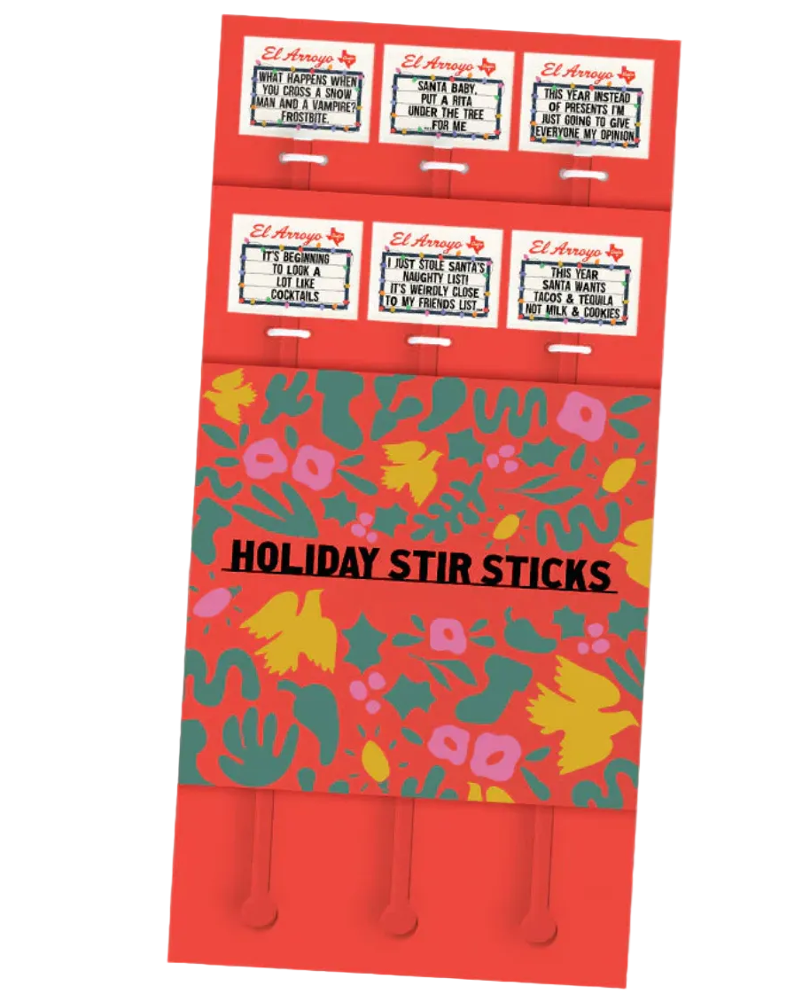 A red holiday-themed stir stick packet with colorful abstract floral patterns and several small white pull tabs at the top. The text 'HOLIDAY STIR STICKS' is printed across the front on a light gray background.