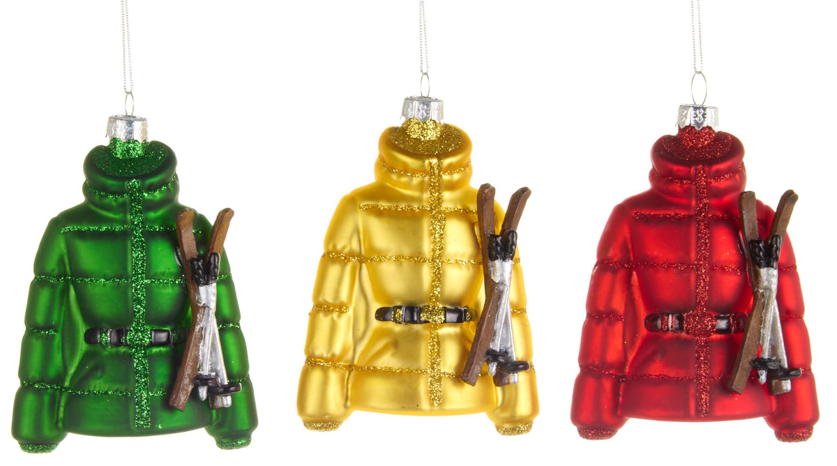 Three colorful puffer jacket ornaments in green, yellow, and red on a white background.