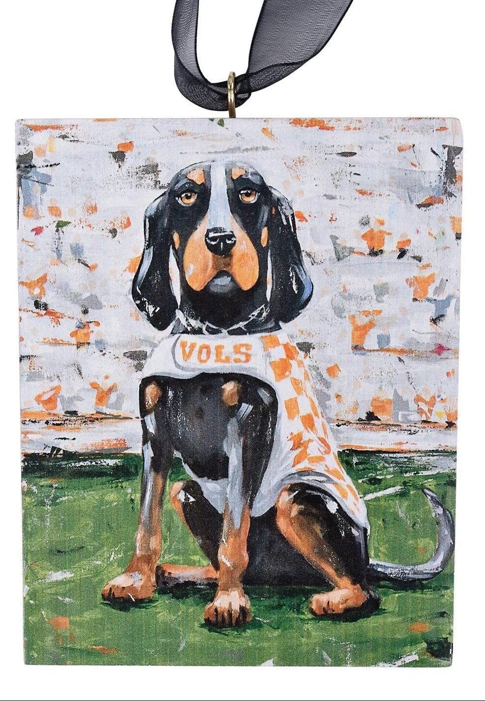 Decorative ornament with a dog wearing a 'VOLS' shirt on a white background
