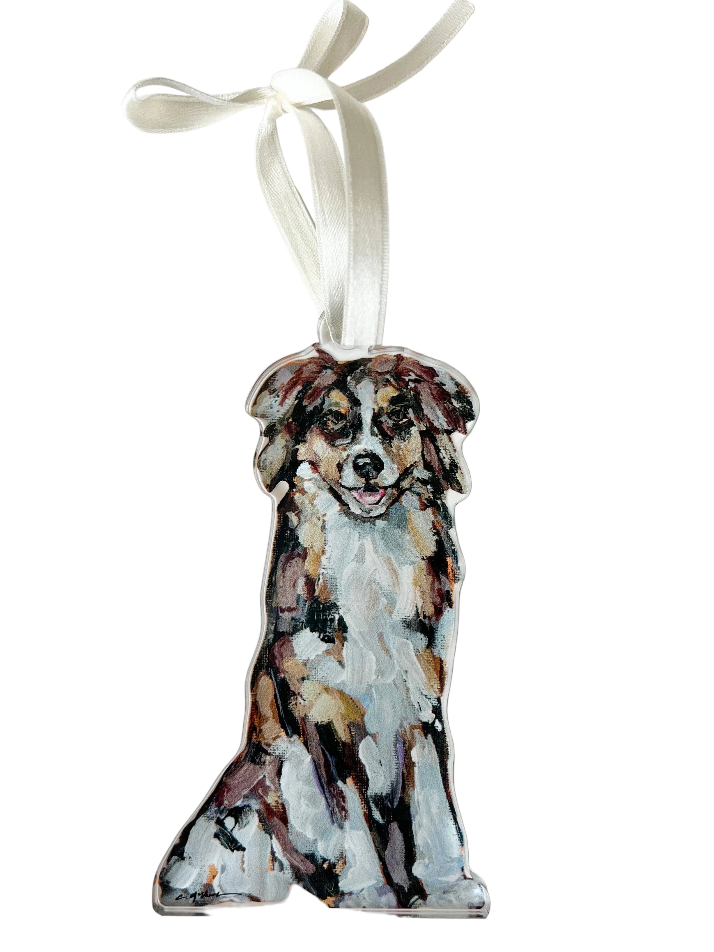 Decorative ornament with a painted dog design on a white background