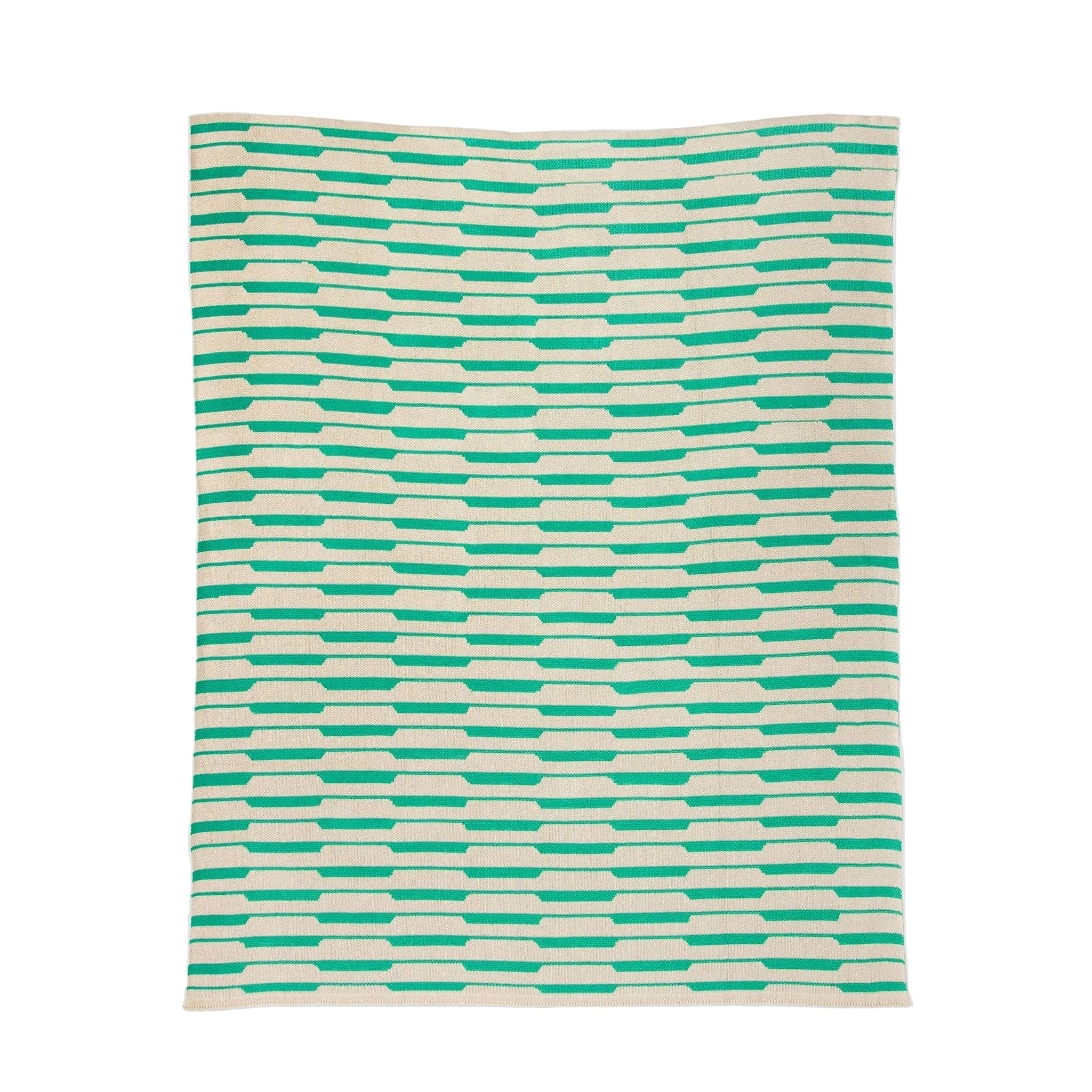 Green and white striped patterned rug on a light gray background