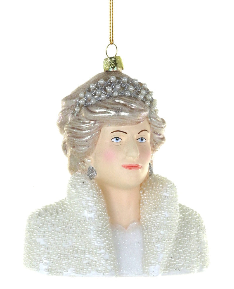 A decorative bust ornament of a woman with gray hair, a jeweled headpiece, and a white beaded coat, hanging against a plain white background.