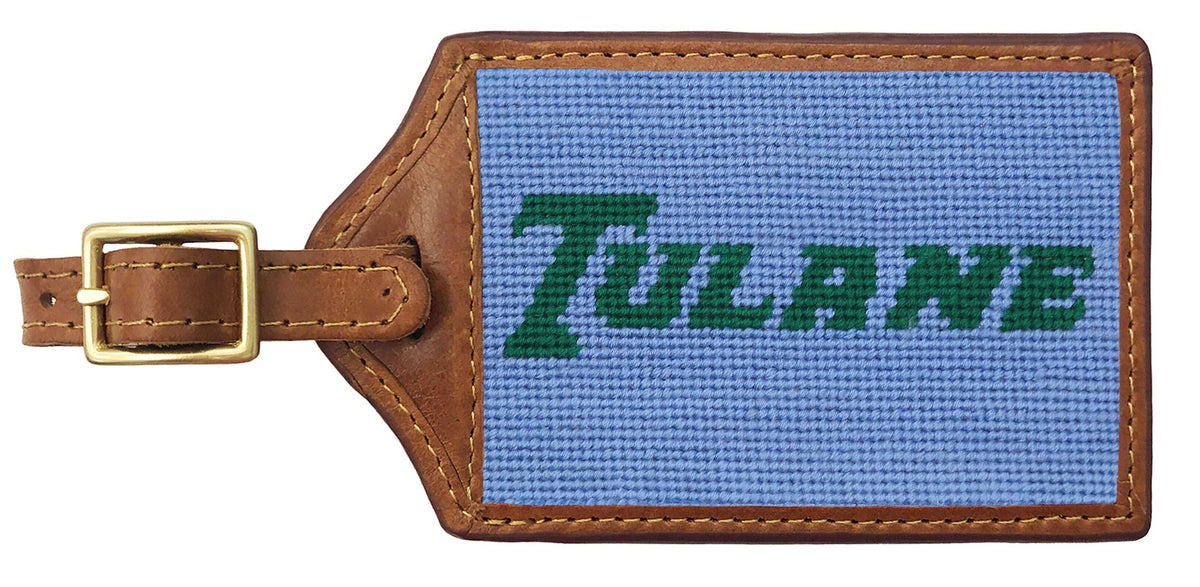 Luggage tag with 'Tulane' text on a blue background