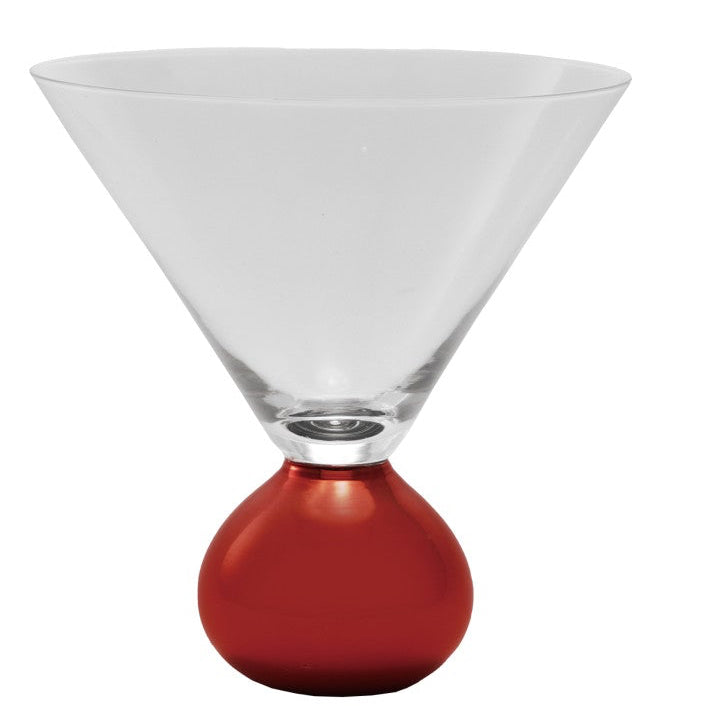 Clear martini glass with a red base on a white background