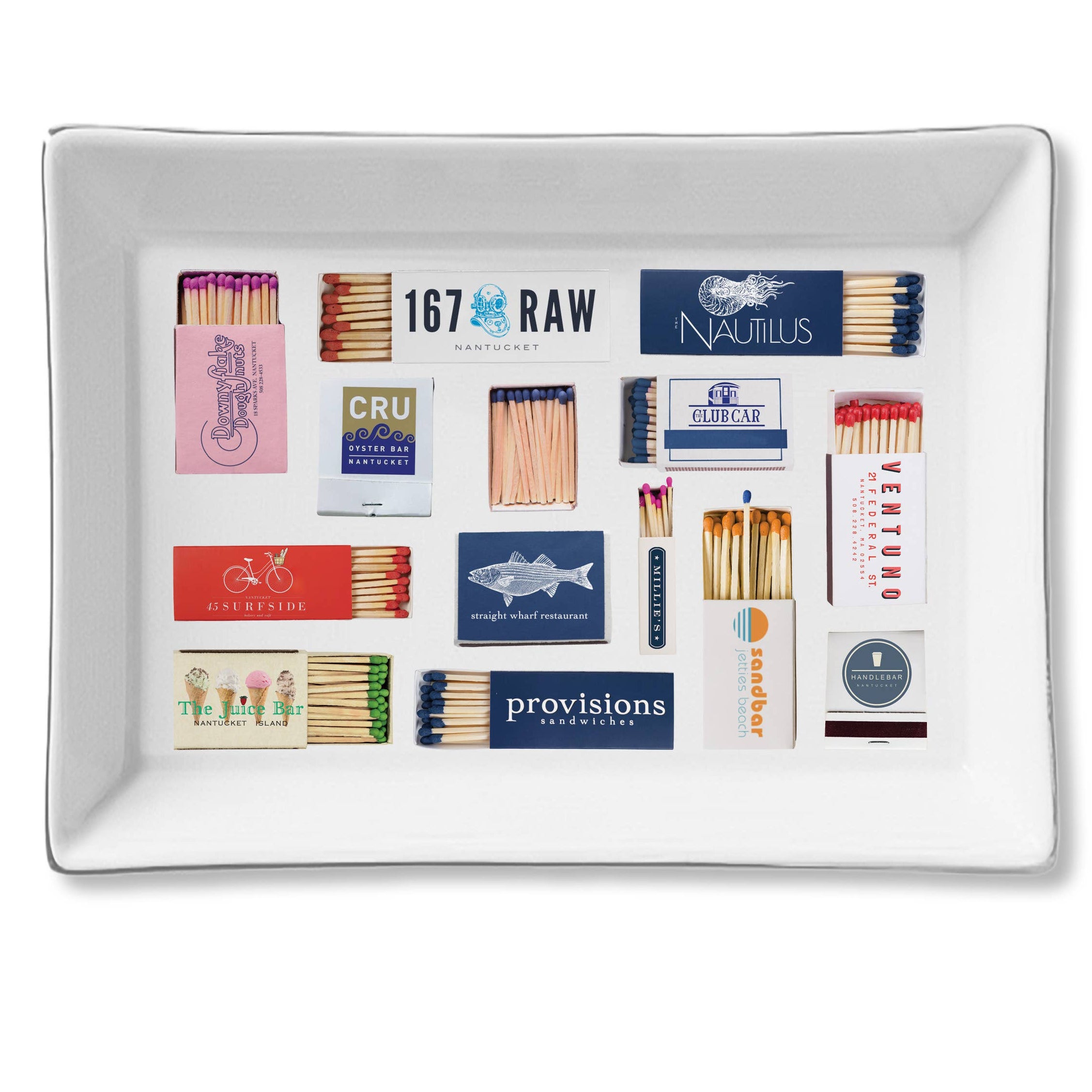 Collection of matches in various packaging on a white tray with a white background