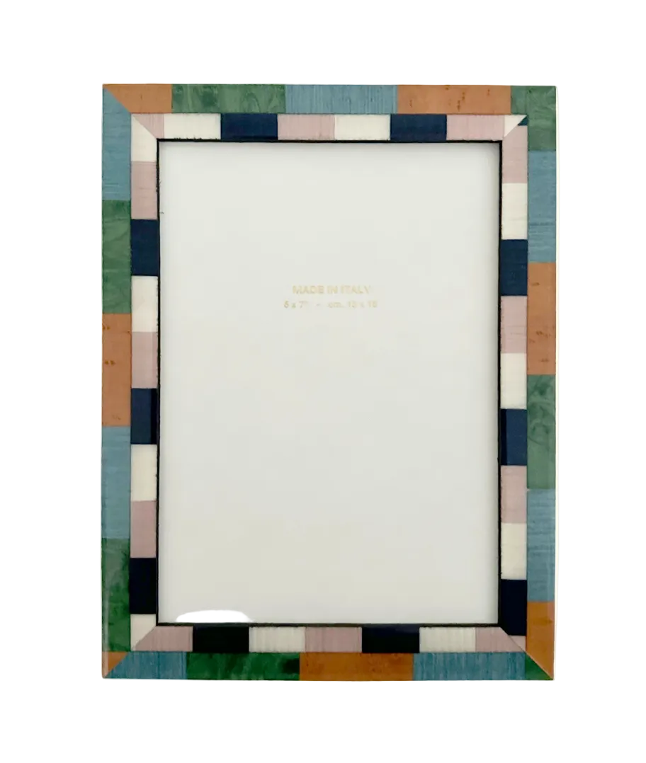 Colorful geometric patterned photo frame on a white background